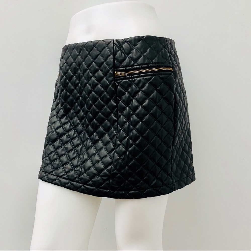 Faux leather quilted mini skirt in black